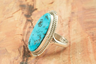 Genuine Sleeping Beauty Turquoise set in Sterling Silver Ring. The Sleeping Beauty Turquoise mine is located in Gila County, Arizona. Created by Navajo Artist Kathy Yazzie. Signed by the artist. 